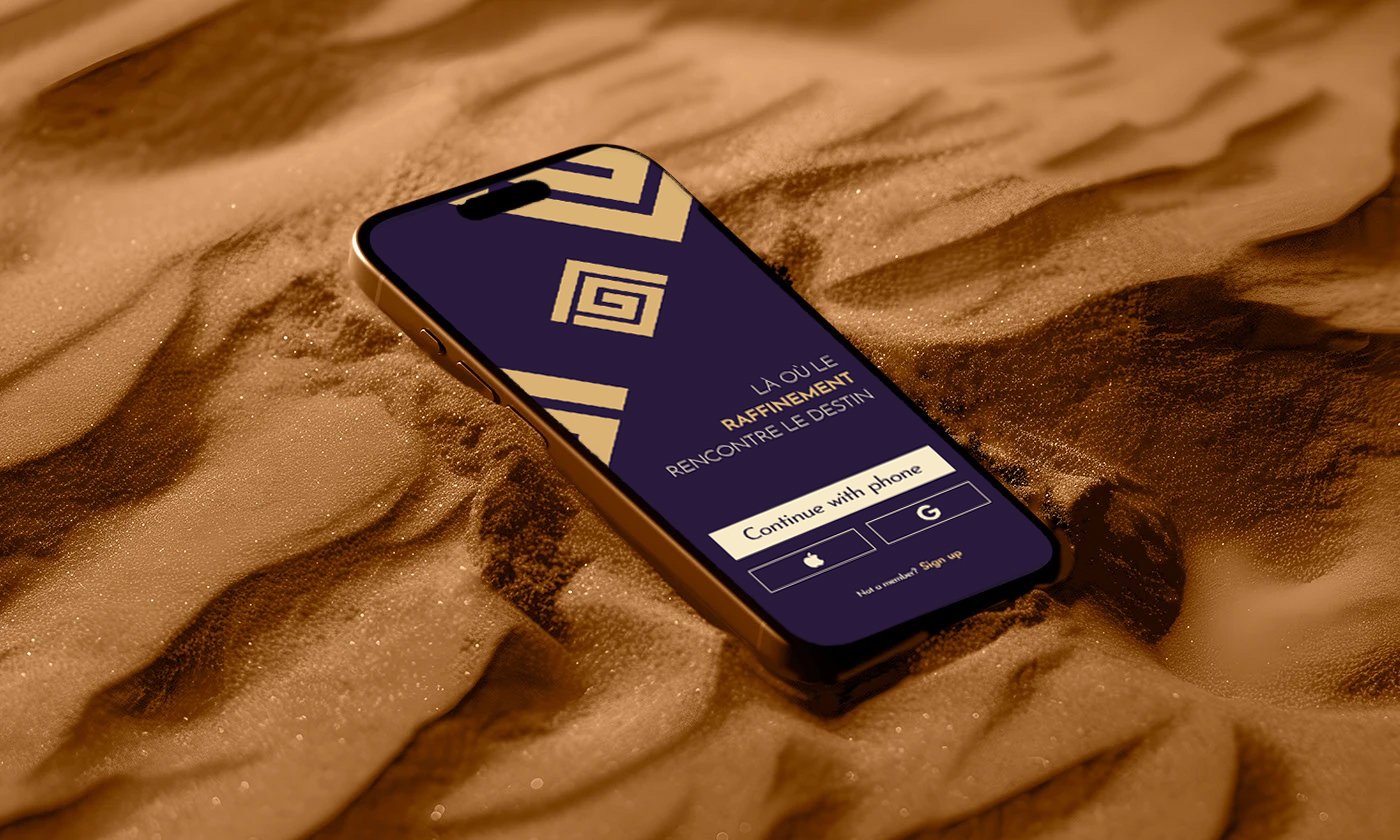 Smartphone Golden Alliance posé sur le sable